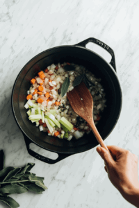 add-remaining-oil-and-saute-onion-carrots-celery-garlic-and-sage-for-4-5-minutes