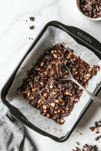 dropping-spoonfuls-of-the-mixture-onto-waxed-paper to let it cool down