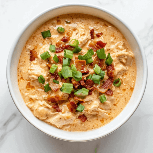 This image shows Keto Crockpot Crack Chicken garnished with cilantro