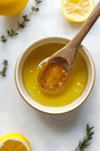 This image shows butter melting in a saucepan over low heat.