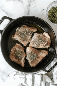season-chicken-thighs-with-herbes-de-provence-and-sea-salt