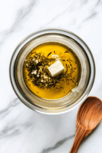 This image shows a blender with tofu and seasonings being processed into a smooth and creamy mixture to form the base for the vegan chicken fillets.