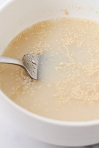 Combine 1.5 cups warm water, one packet yeast