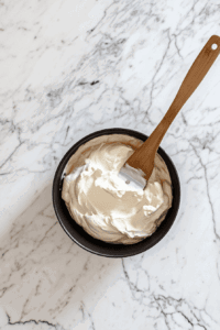 This image shows the cooled Vegan Sugar Cream Pie filling, ready to be poured into the partially baked pie crust for the final assembly.