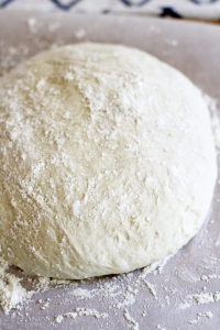 Flip the dough so the floured side faces