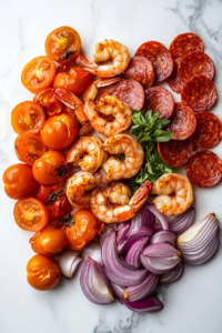 This image shows raw shrimp being peeled and readied for the Keto Sheet Pan Shrimp recipe.