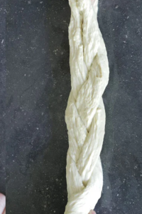 Shape the dough into a braid, knot it