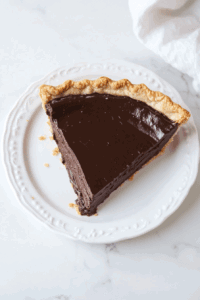 This image shows the dish being plated and served, with a garnish added for a fresh and visually appealing presentation, ready to be enjoyed.