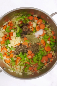 Add thyme, tarragon, bay leaf, chicken