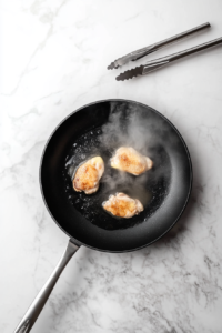 cooking-another-batch-of-chicken-in-the-pan