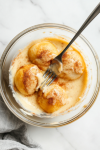 dipping-hawaiian-rolls-in-egg-custard