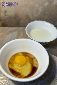 In another bowl, whisk the egg