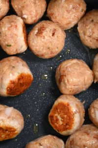 Lightly brown the meatballs