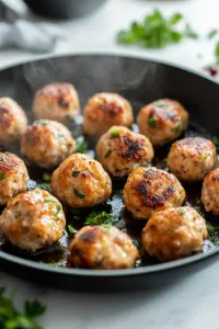 Lightly brown the meatballs