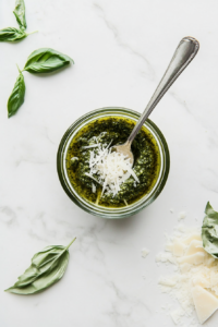 mixing-fresh-pesto-sauce-in-a-bowl