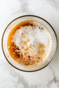 mixing-wet-ingredients-for-texas-roadhouse-rolls-dough