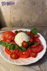 Place the burrata ball gently