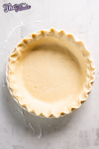 Place the unbaked pie crust into the pie dish