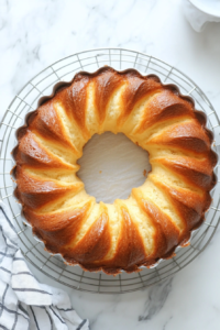 This image shows a babka in the oven, rising and turning golden brown, filling the kitchen with a warm and sweet aroma.