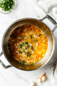 sauteing-onions-garlic-and-ginger-in-butter-until-golden-and-fragrant