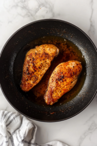 searing-chicken-pieces-in-a-pan-for-chicken-tequila-fettuccine