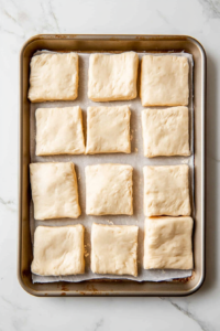 shaping-texas-roadhouse-rolls-dough-into-squares