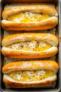 toasting-garlic-butter-hoagie-rolls-in-a-pan