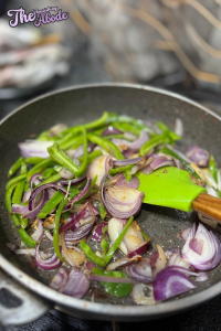 then sauté onions and sliced poblanos for 5 minutes