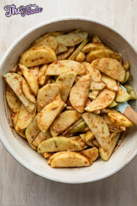 toss the apples with sugar, cinnamon, nutmeg, salt,
