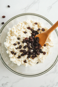 Adding-Raisins-to-the-Mixture-for-Traditional-Irish-Soda-Bread-9340994-683x1024-1561219 step 4