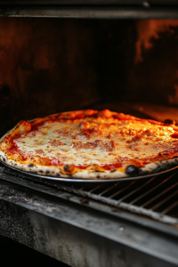 This image shows a pizza dough base with various toppings being added, ready for baking into a delicious pizza.
