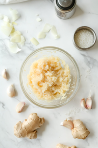 This image shows ripe tomatoes being blended into a smooth puree, adding a tangy depth to the Mushroom Masala.