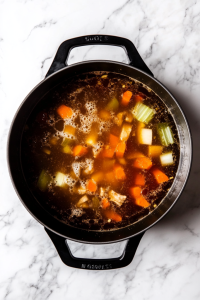 Bringing-the-Soup-Broth-to-a-Boil-for-a-Flavorful-Base-4184035-683x1024-1625716