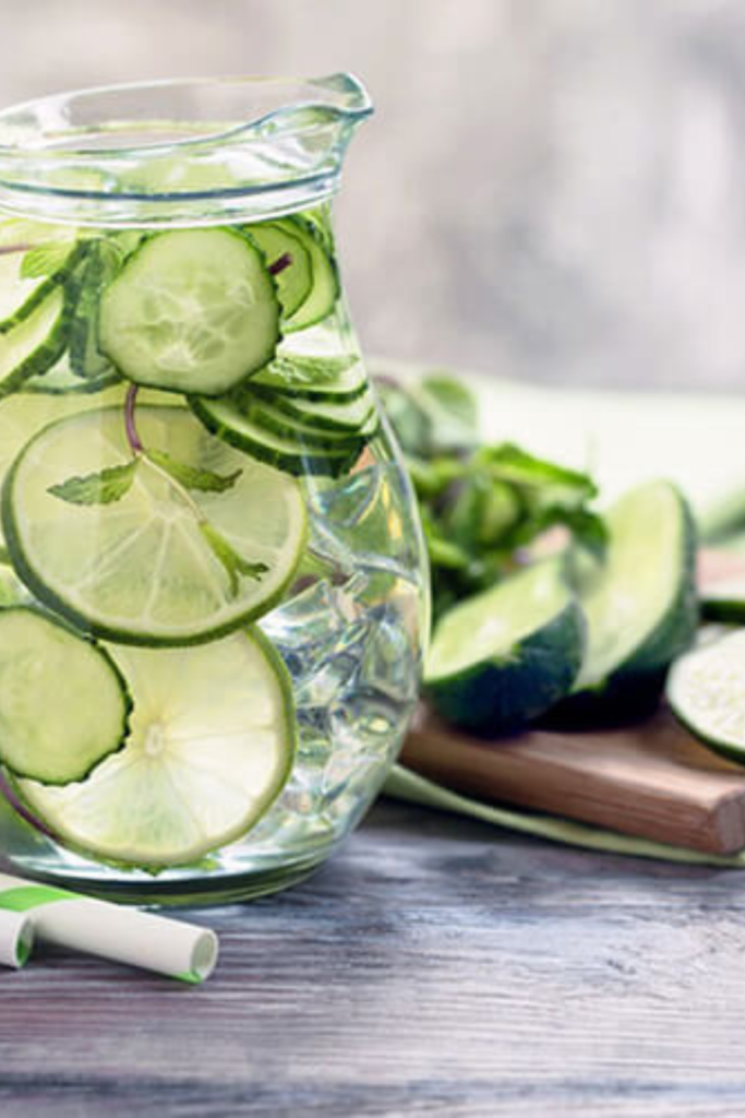 cool-cucumber-water-with-ice-cubes-and-thinly-sliced-cucumber-rounds-in-a-pitcher