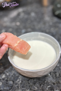Dip fish filets into the batter