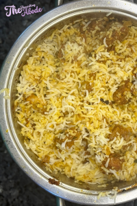 Fluff the biryani lightly and serve it hot