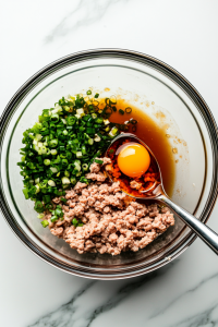 Mixing-Wonton-Filling-with-Ground-Meat-Shrimp-and-Seasonings-for-the-Perfect-Texture-2299539-683x1024-3730012