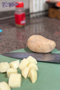 Peel the potatoes and cut