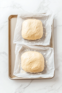 preparing-the-baking-sheets-for-the-loaves