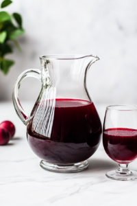 serving-a-refreshing-glass-of-kompot-with-fruit-pieces-for-a-flavorful-and-natural-beverage