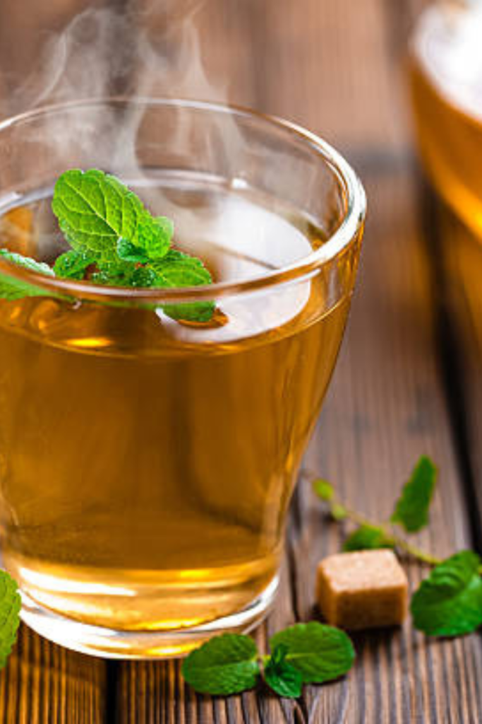 streaming-up-of-green-tea-with-loose-tea-leaves-and-serene-background
