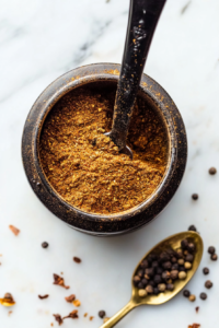 grinding-roasted-karahi-masala-into-a-fragrant-spice-blend
