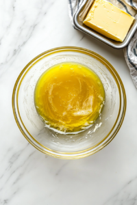 melting-butter-in-a-bowl-for-rich-and-moist-banana-bread-texture