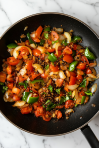 stirring-in-ginger-garlic-paste-and-tomatoes-for-a-bold-masala