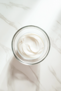 adding-rich-mayonnaise-into-small-mixing-bowl-to-begin-spicy-mayo-preparation