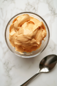 tasting-spicy-mayo-and-adjusting-heat-level-for-perfect-flavor