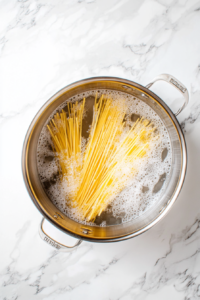 boiling-noodles-to-soften-and-prepare-for-sweet-chili-goodness-2
