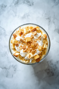 chilled-and-set-banana-vanilla-pudding-trifle-ready-to-be-served-in-glass-bowl