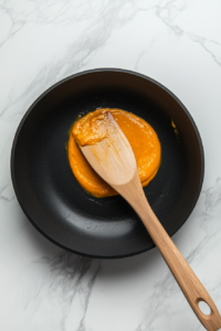 creamy-pumpkin-puree-and-heavy-cream-blending-into-a-silky-orange-sauce