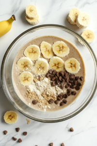 final-addition-of-flour-being-added-to-form-the-soft-dough-for-cinnamon-rolls